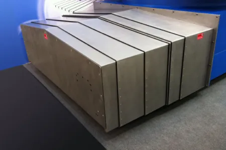 Arquitetura de um protetor telescópico sobre guias de máquinas